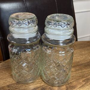1984 Planters Peanut jar glass jar with sealed lid.